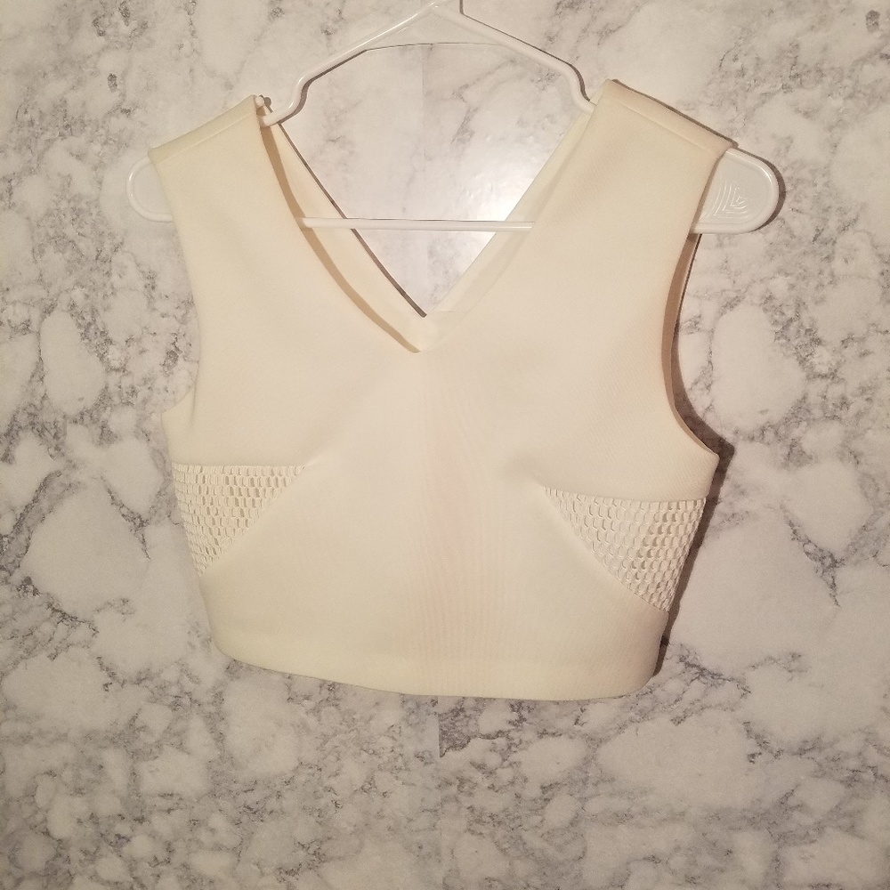Women's white V-Neck Crop Top with lined cut outs